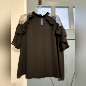 Black blouse with see-through shoulders